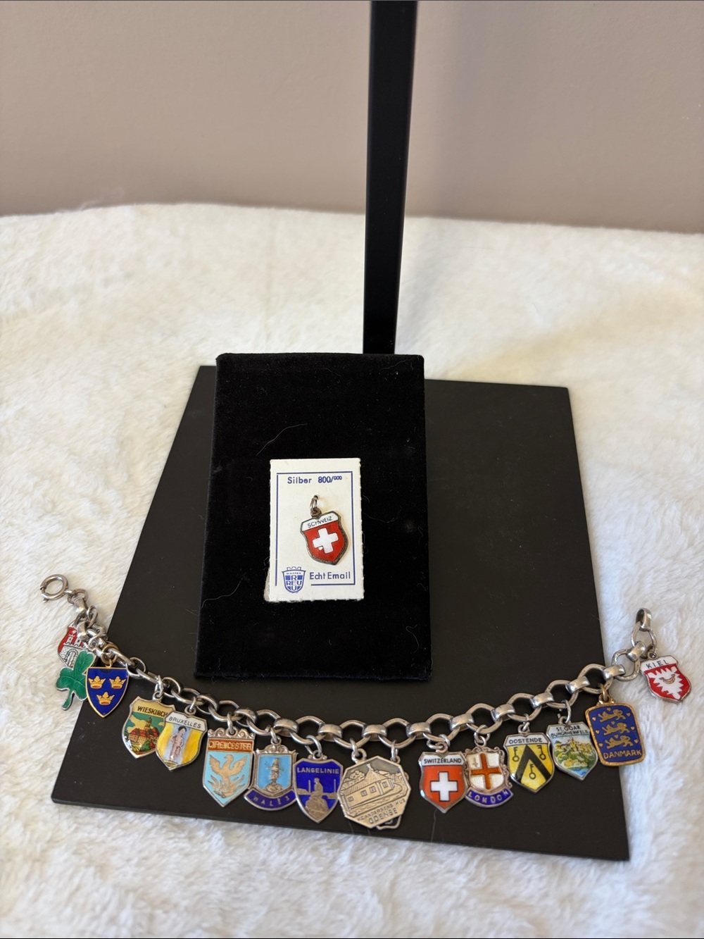 Vintage Swiss Charm Bracelet. Many marked sterling / silver